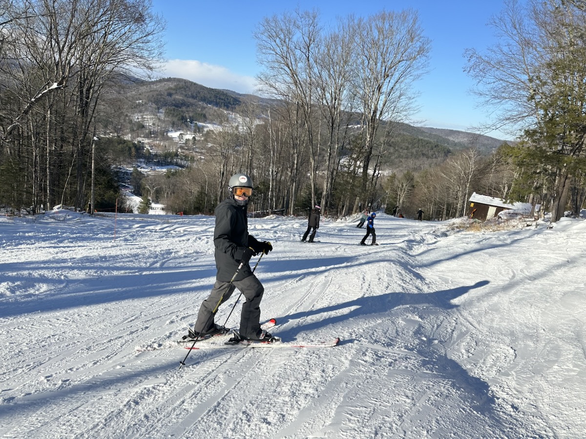 YangMing skiing on a groomed trail
